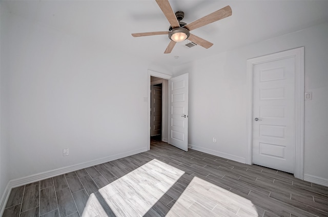 unfurnished bedroom featuring light hardwood / wood-style flooring and ceiling fan