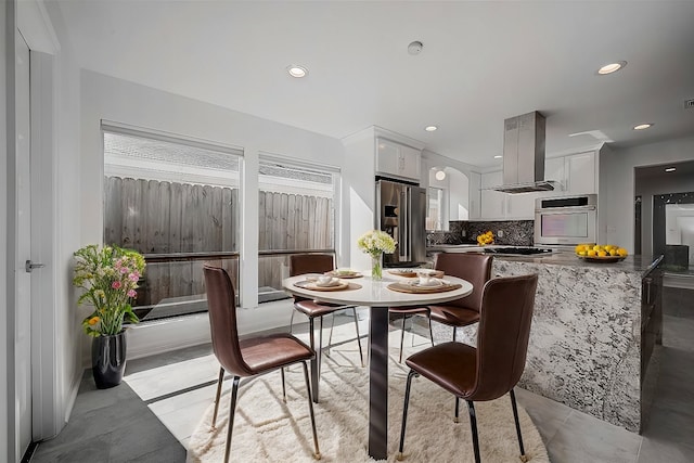 view of tiled dining space