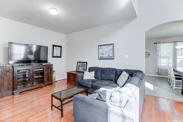 living room with light hardwood / wood-style flooring