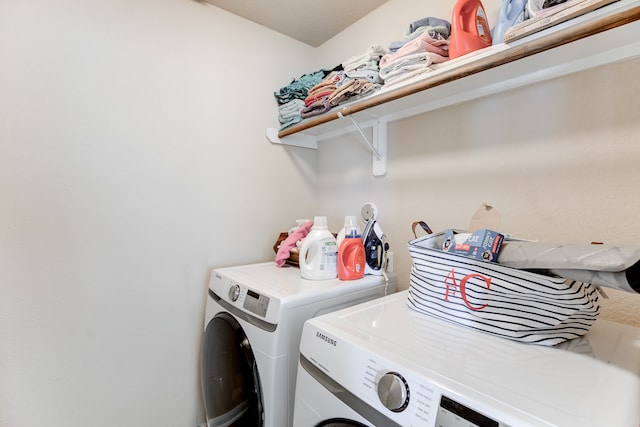 washroom featuring independent washer and dryer