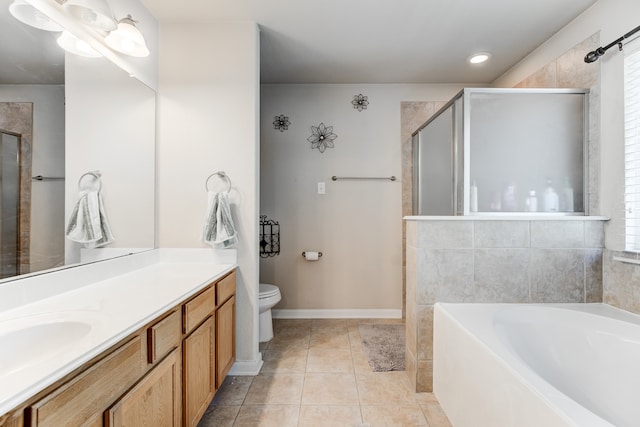 full bathroom featuring tile patterned floors, vanity, separate shower and tub, and toilet