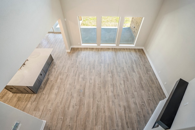 unfurnished living room featuring light hardwood / wood-style flooring