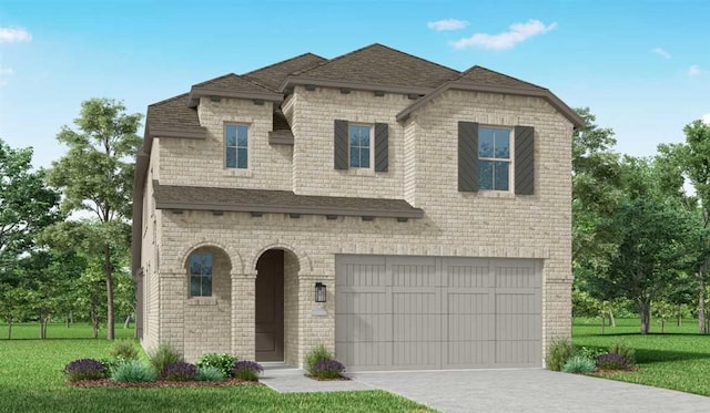 french country inspired facade featuring a garage and a front lawn