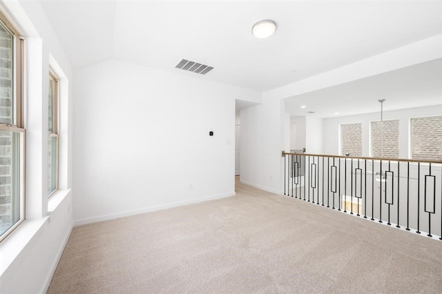 7427 Cattail Falls Ln, Porter, TX 77365 - carpeted empty room featuring baseboards and lofted ceiling