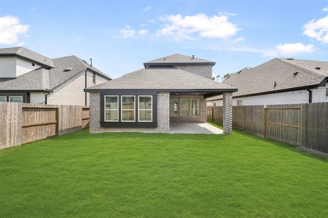 7427 Cattail Falls Ln, Porter, TX 77365 - rear view of house featuring a patio area, brick siding, and a shingled roof