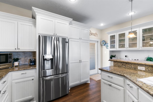 kitchen featuring pendant lighting, dark hardwood / wood-style floors, white cabinetry, and stainless steel fridge with ice dispenser