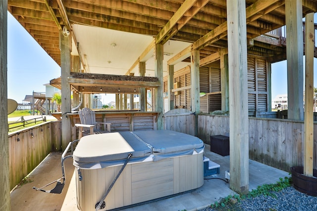 view of patio with a hot tub