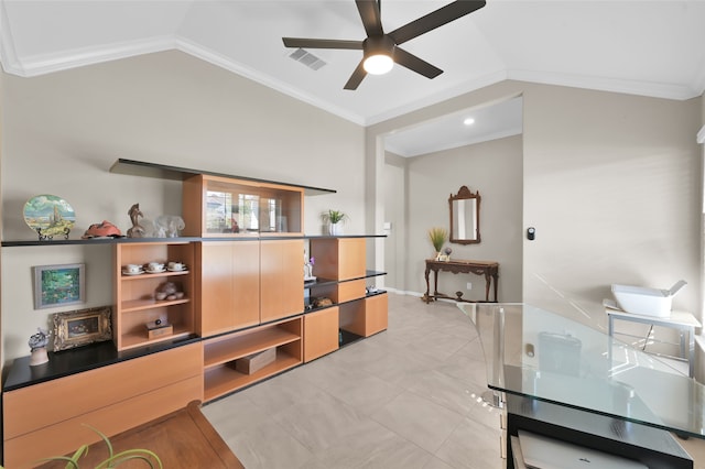 interior space with ceiling fan, ornamental molding, and vaulted ceiling