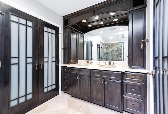 bathroom featuring vanity, a shower, and lofted ceiling