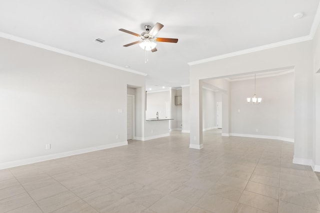 empty room featuring ceiling fan with notable chandelier and ornamental molding