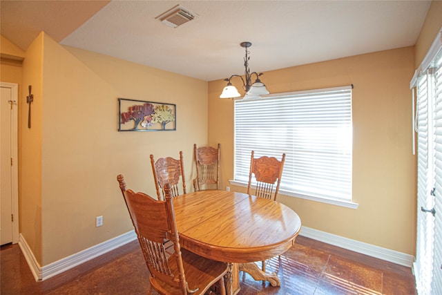 dining room featuring a chandelier