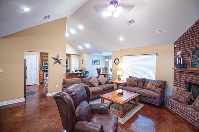 living room featuring a fireplace, ceiling fan, and lofted ceiling