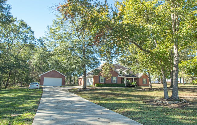 ranch-style house featuring an outbuilding and a front lawn