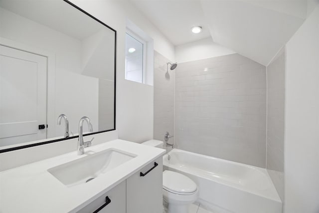 full bathroom featuring toilet, bathing tub / shower combination, and vanity