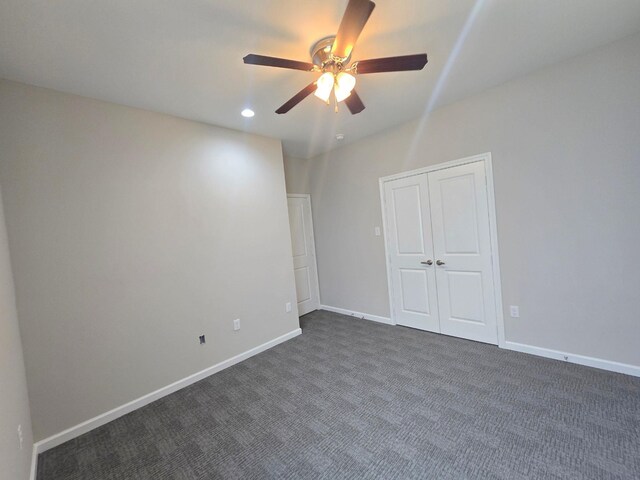 5251 Dewberry St, Houston, TX 77021 - unfurnished room with a ceiling fan, dark colored carpet, baseboards, and recessed lighting