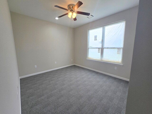 5251 Dewberry St, Houston, TX 77021 - unfurnished room featuring a ceiling fan, baseboards, dark colored carpet, and recessed lighting