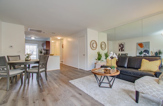 living room featuring light hardwood / wood-style flooring