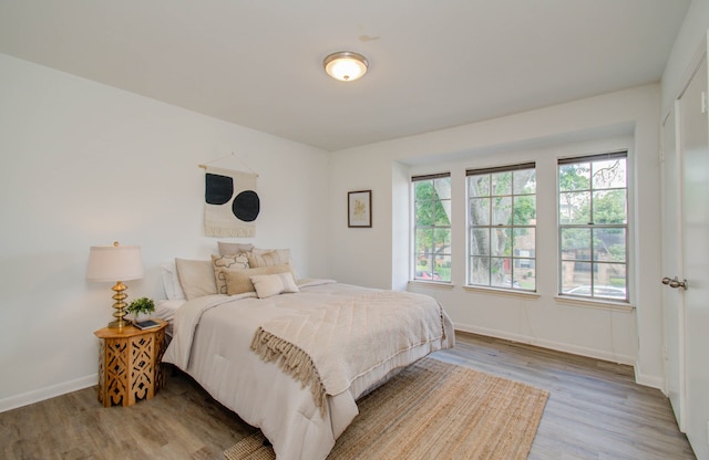 bedroom featuring light wood-type flooring