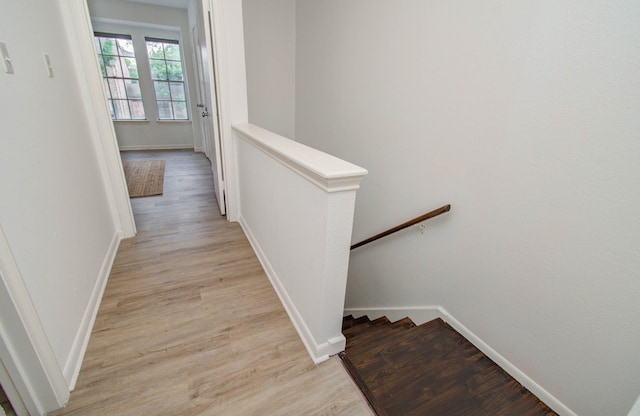 corridor featuring light hardwood / wood-style floors