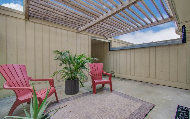 view of patio featuring a pergola