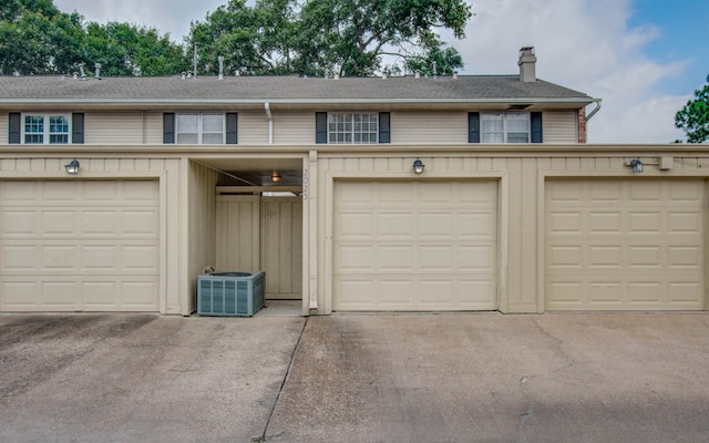 garage with central AC unit