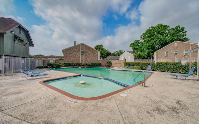 view of pool with a patio area