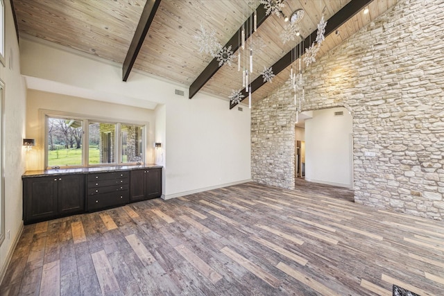 interior space with high vaulted ceiling, wooden ceiling, and wood finished floors