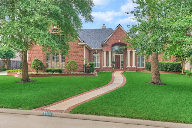 view of front of home with a front yard