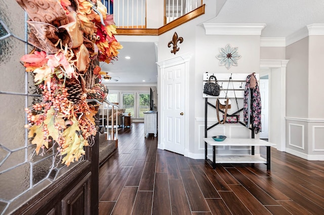 entryway with crown molding