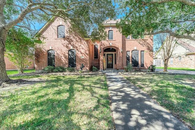 view of front of property with a front lawn