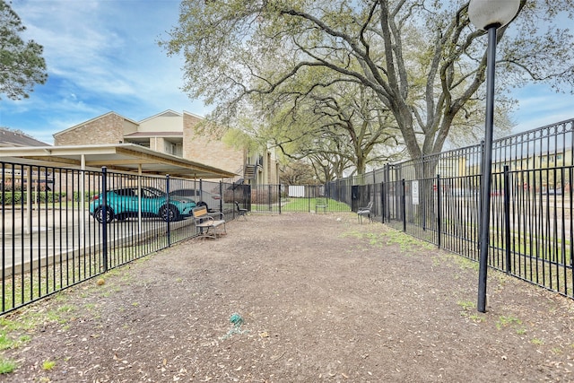 exterior space featuring a carport