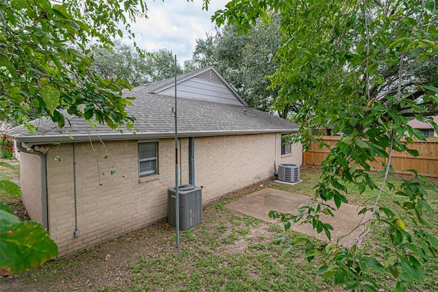 view of side of property featuring cooling unit