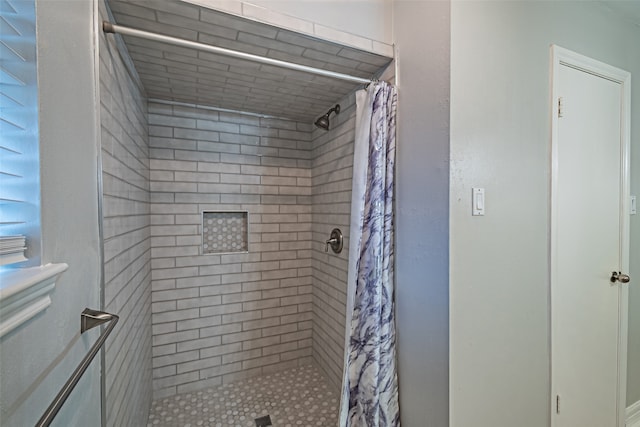 bathroom with curtained shower