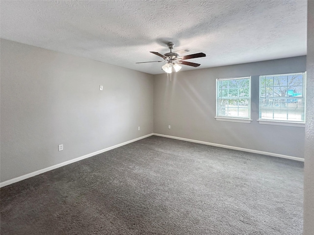 unfurnished room with ceiling fan, carpet floors, and a textured ceiling