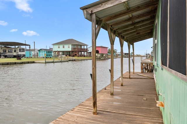 dock area with a water view