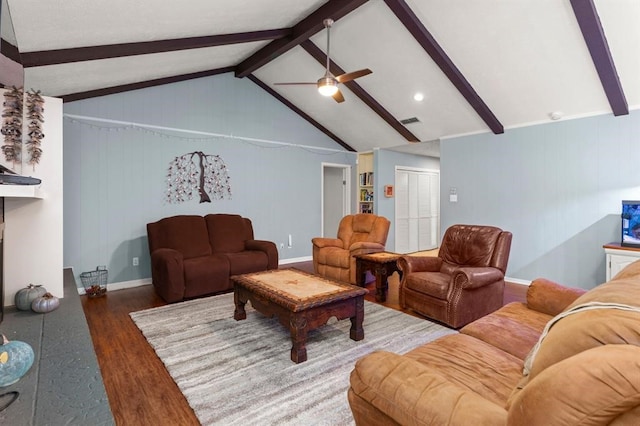 living room with lofted ceiling with beams, dark hardwood / wood-style floors, and ceiling fan