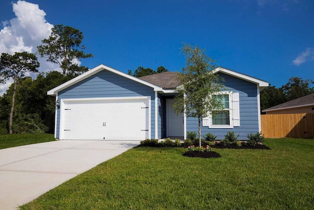 ranch-style house featuring a garage and a front lawn