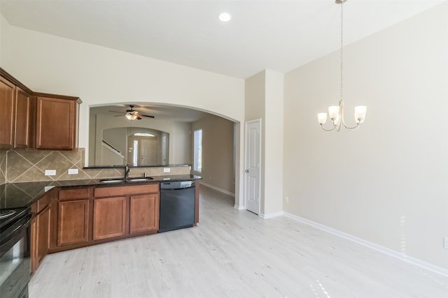 kitchen featuring black appliances, ceiling fan with notable chandelier, light hardwood / wood-style flooring, tasteful backsplash, and decorative light fixtures