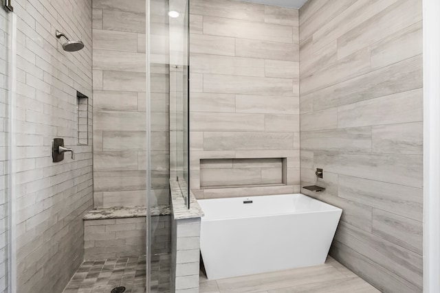 bathroom with independent shower and bath