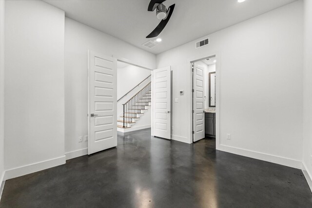 interior space featuring ceiling fan