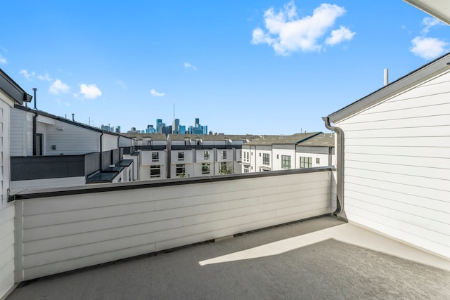 view of patio featuring a balcony