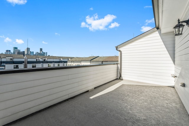 view of patio with a balcony