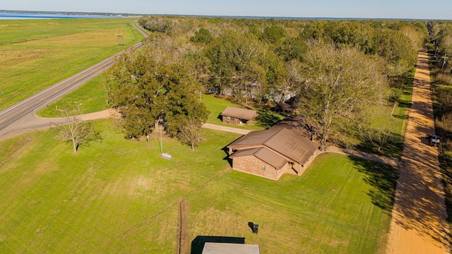 drone / aerial view featuring a rural view and a water view