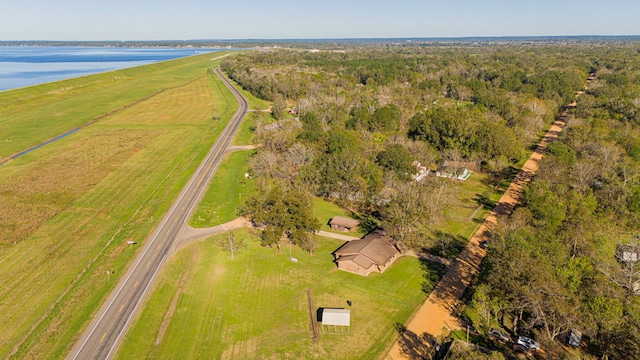 drone / aerial view featuring a rural view and a water view