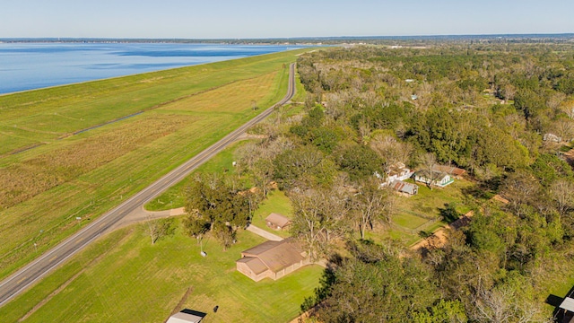 drone / aerial view featuring a water view and a rural view