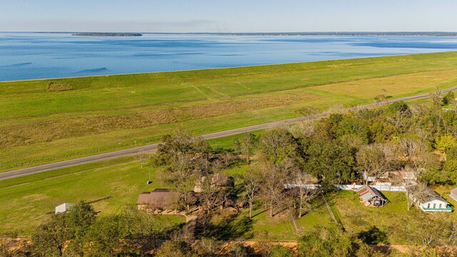 bird's eye view featuring a rural view and a water view