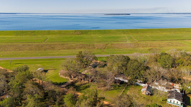 drone / aerial view with a rural view and a water view