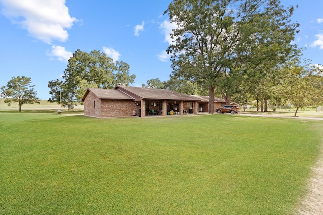 exterior space featuring a front lawn