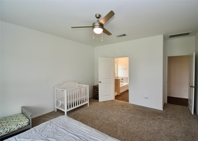 bedroom featuring dark carpet and ceiling fan