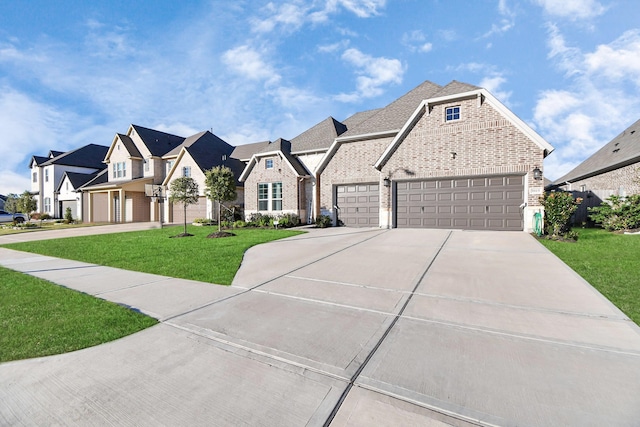 view of front facade featuring a front lawn and a garage